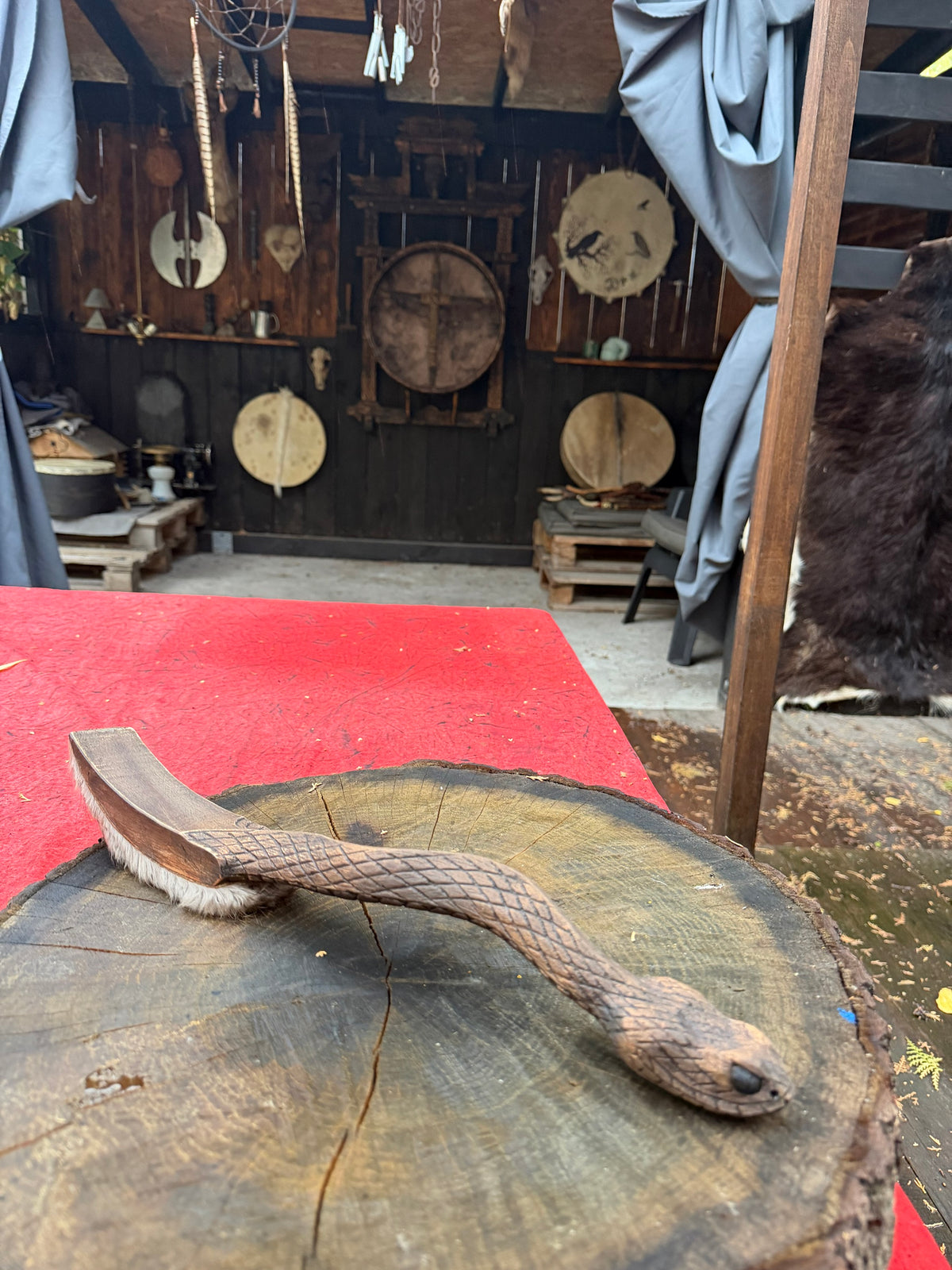 Snake drum beater in the workshop